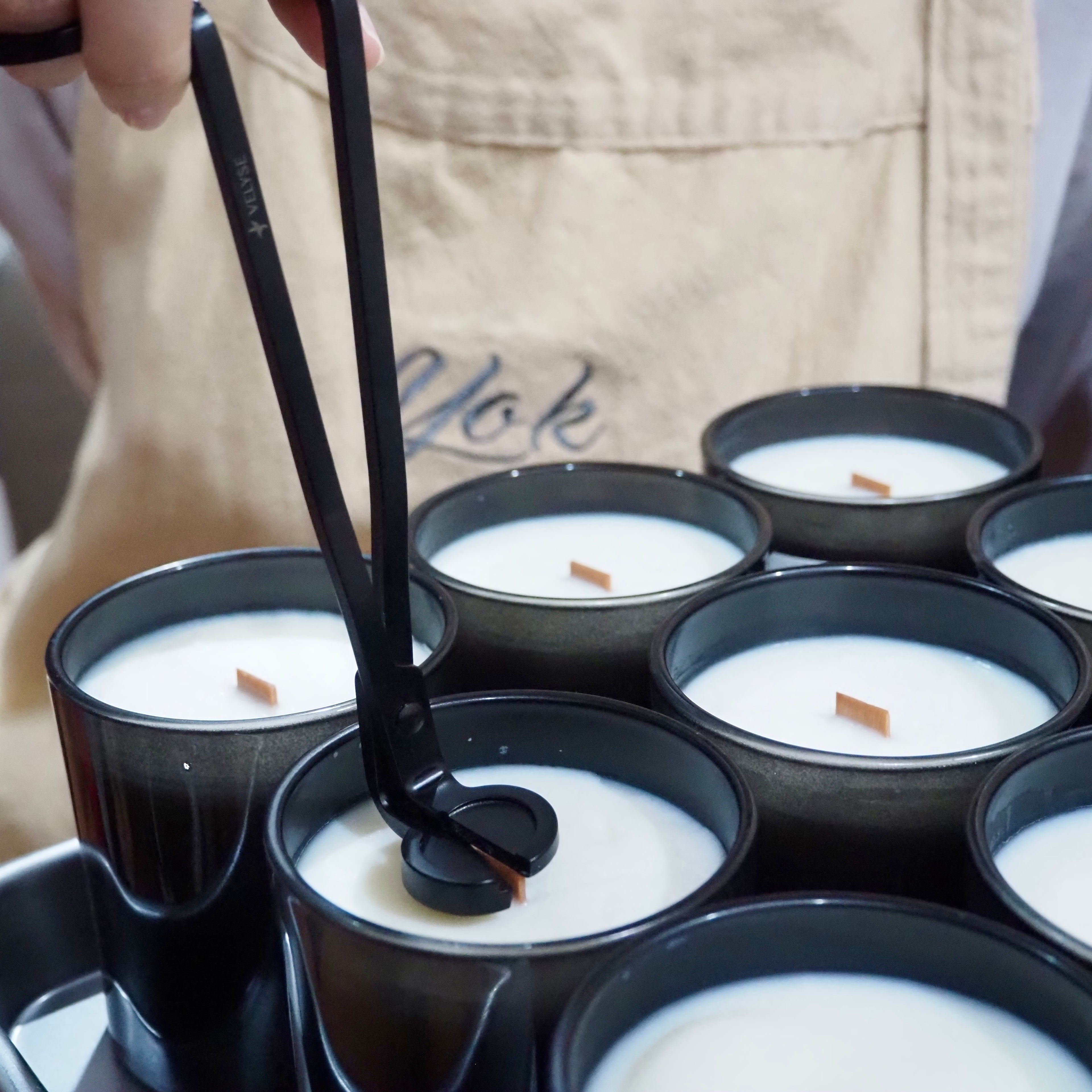 Close up shot of cutting wooden wick