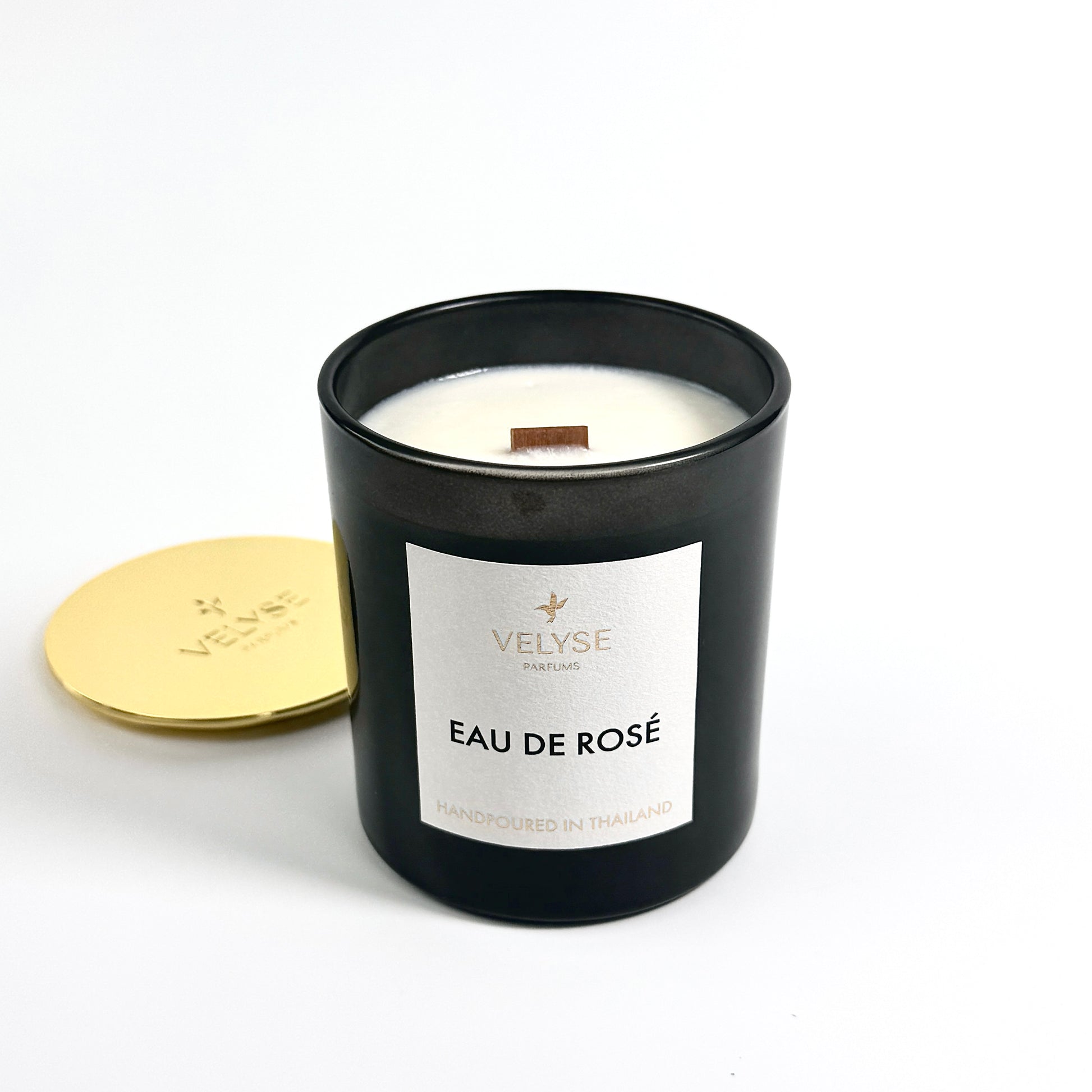 Eau de Rosè luxury candle burning 