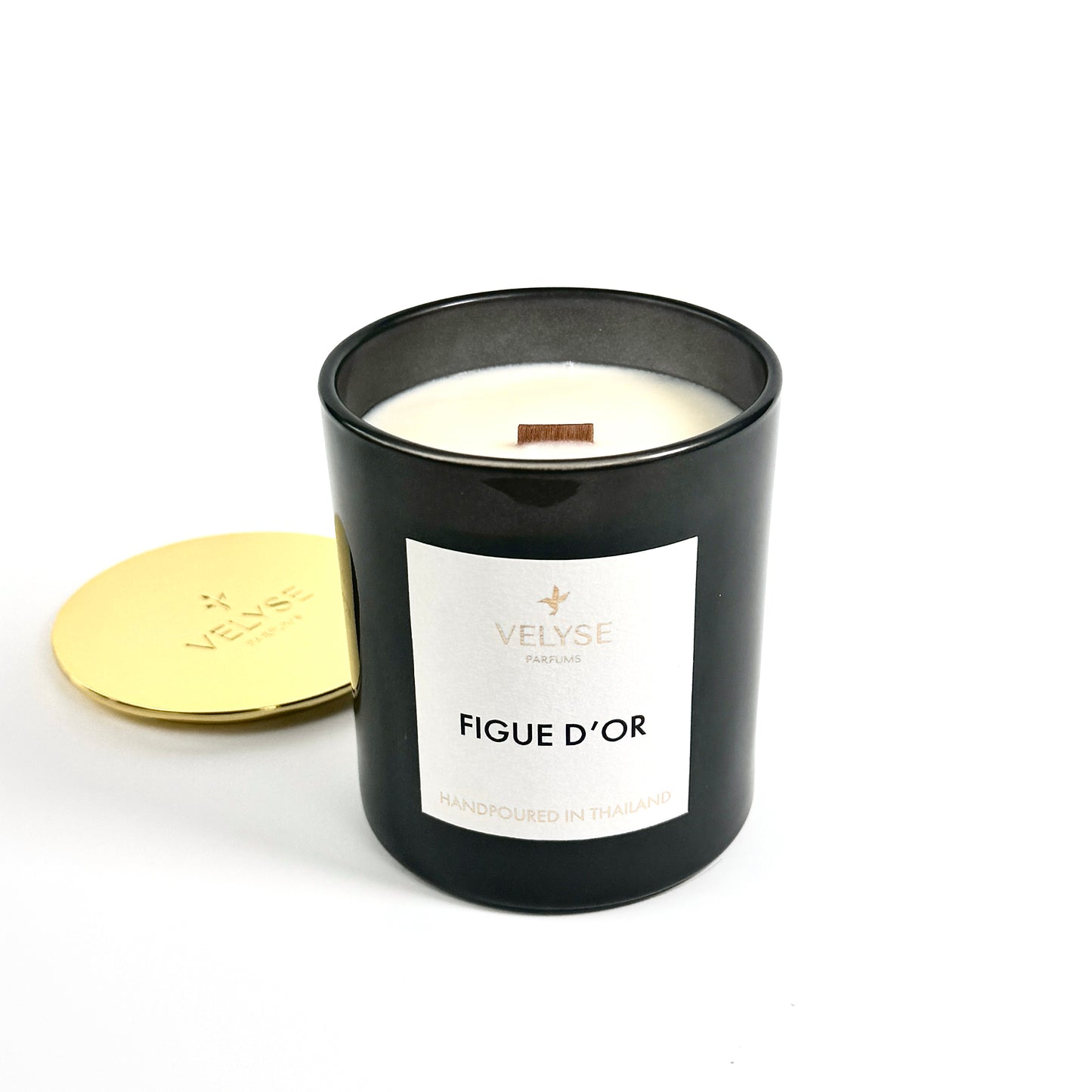 Figue d’Or luxury candle burning