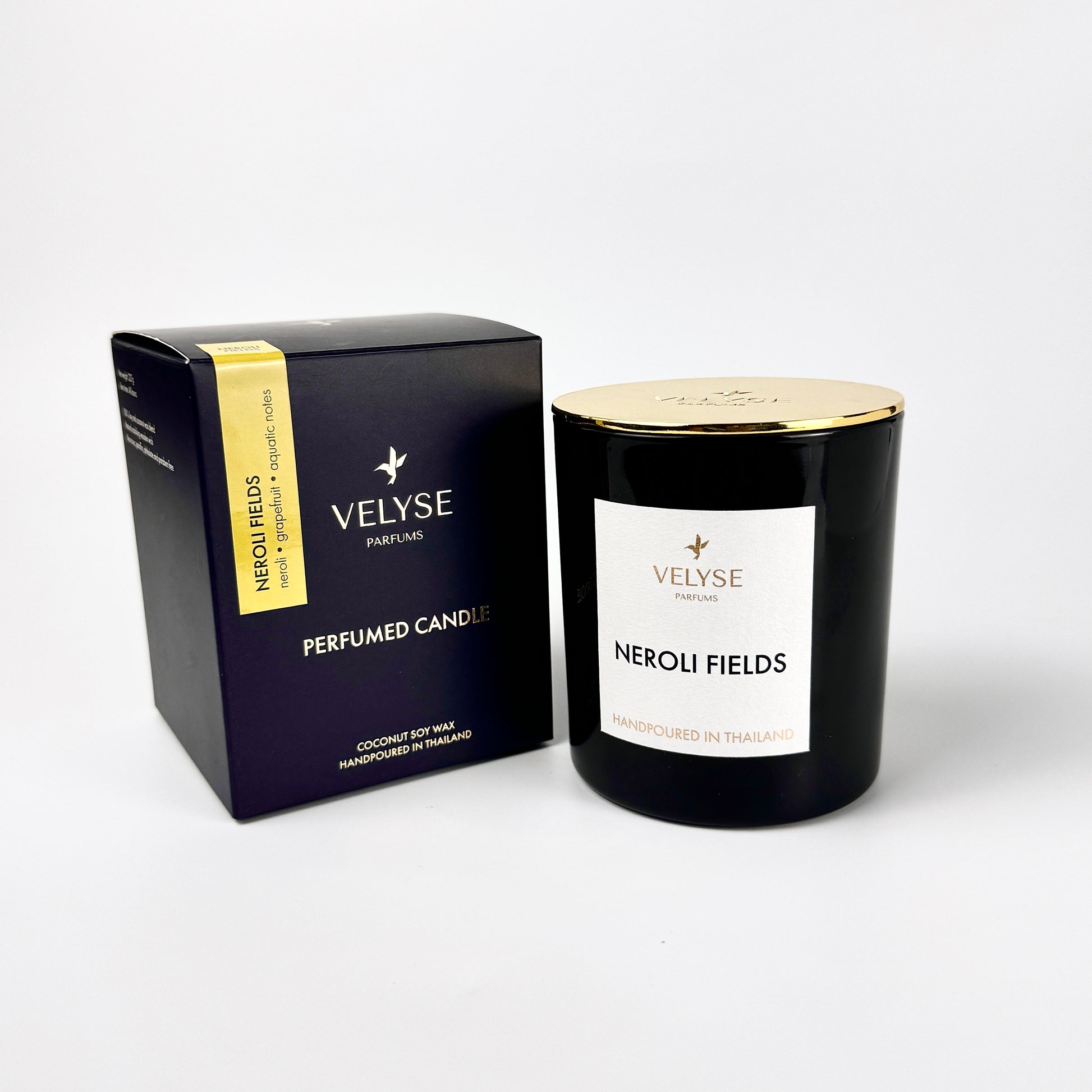 Neroli Fields luxury candle with gold metal lid and packaging box