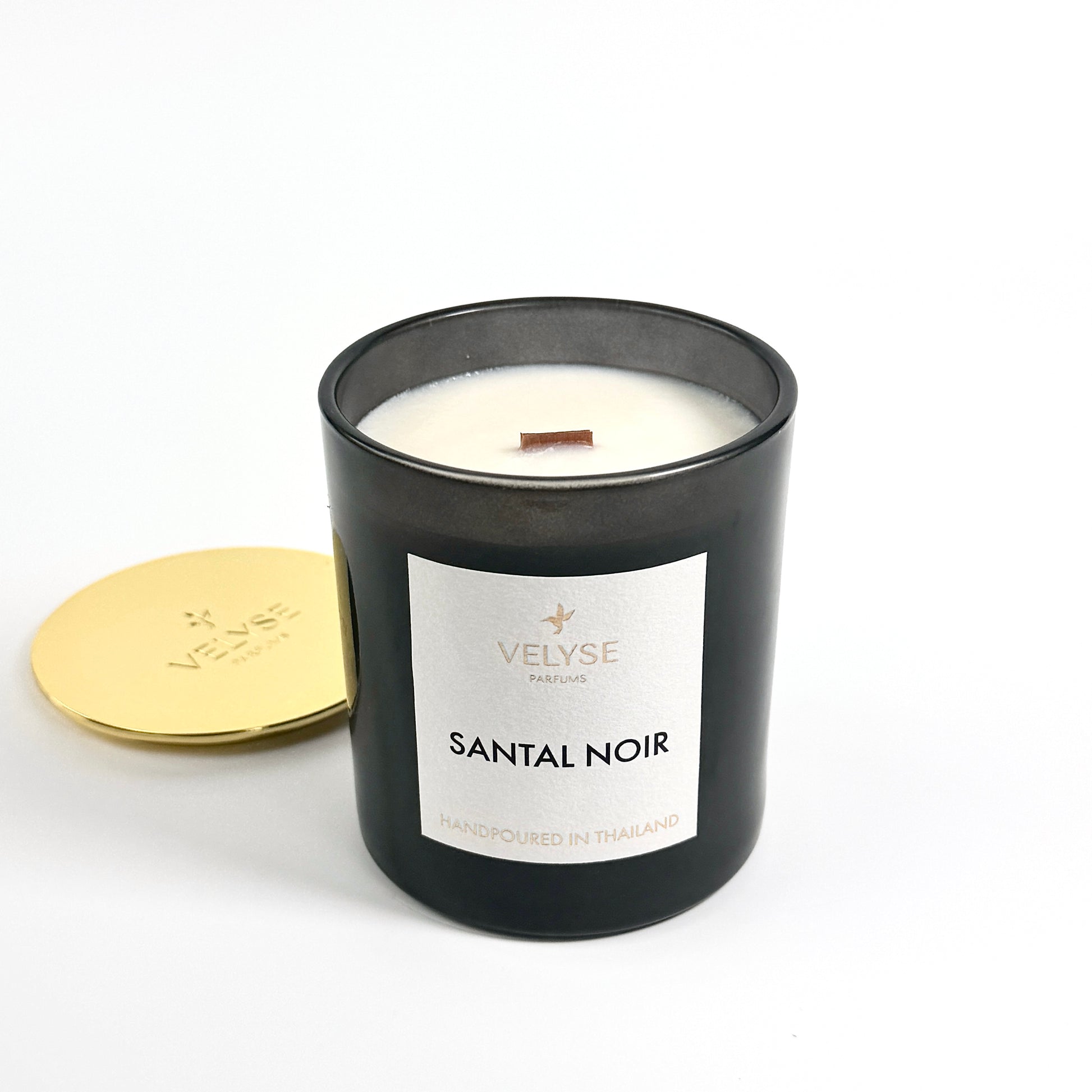 Santal Noir luxury candle burning